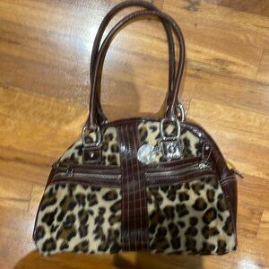 Woman bag not new animal print good condition